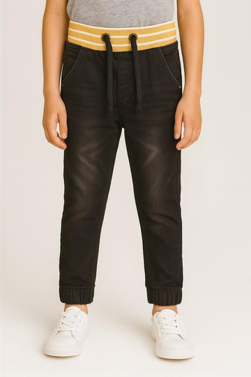 "Boys’ Black Denim Jogger Pants with Yellow-Striped Ribbed Waistband" /MH