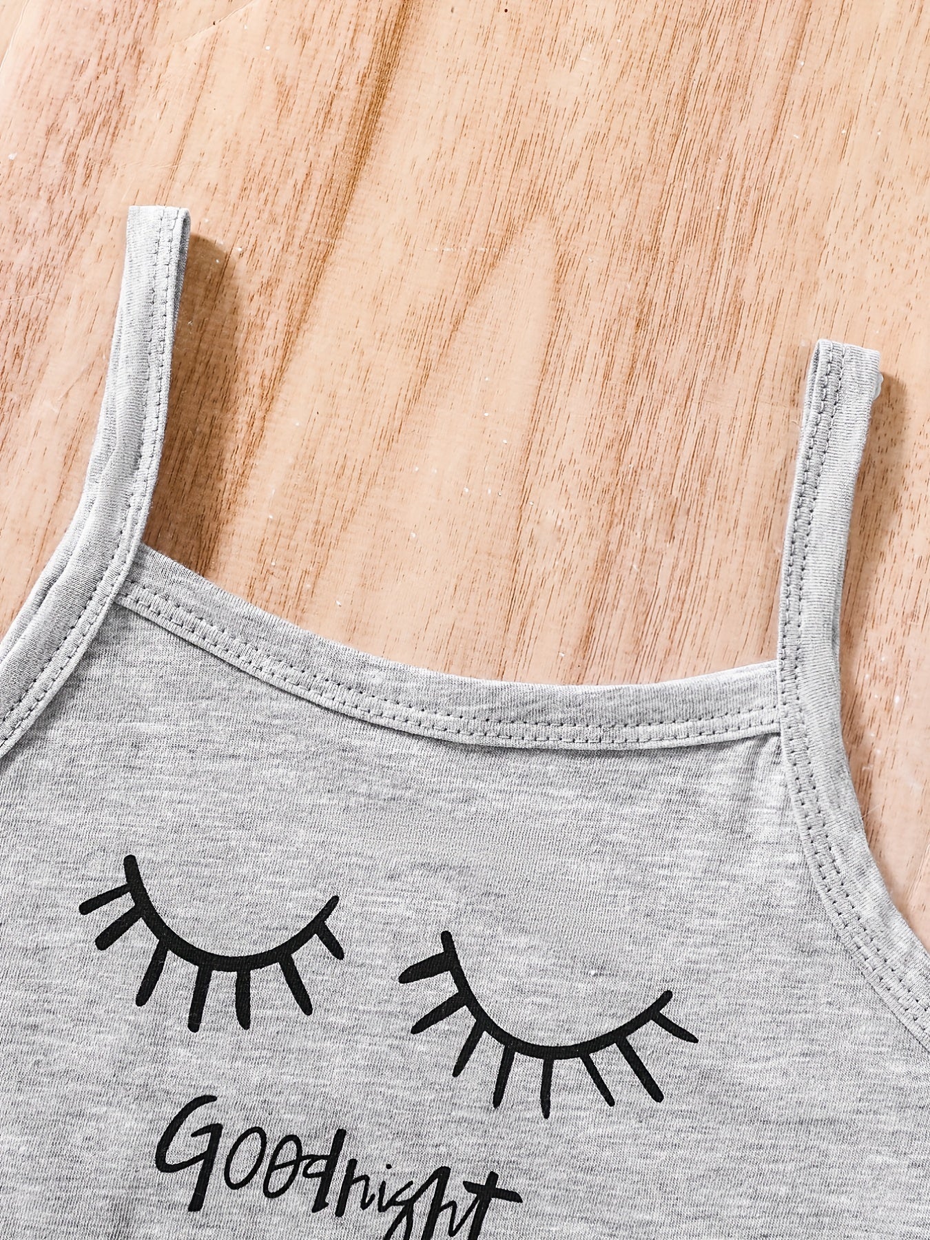 Girls Comfortable Outfit Eyelash Graphic Cami Top & Elastic Waist Ruffled Hem Shorts Set